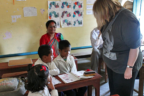Annapurna-School-Teacher1 Volunteer Val Jamiason drills English prepositions