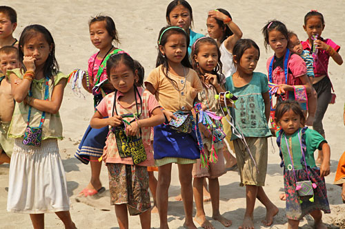 LuangSayCruise-Hmong-Vlg2 Hmong hill tribe children gather on shore to meet our boat