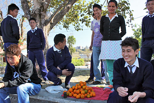 Pokhara-Orange-Peels Nepali kids convince me to throw orange peels in field for recycling