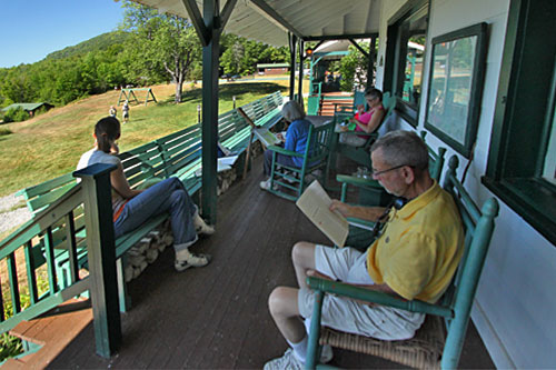 Adirondacks-Irondequoit-Inn-Porch Relaxing on the porch at Irondequoit Inn